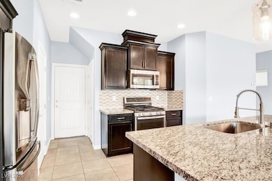 tile flooring, gas cooktop & upgraded lighting.