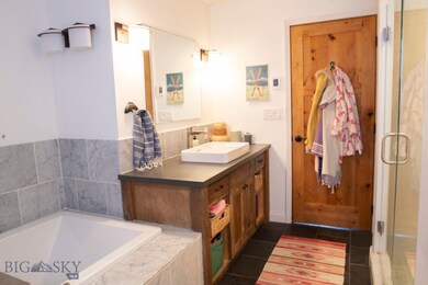 Bathroom with vanity, tile patterned floors, and i
