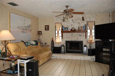 The family room flows into room for formal dining