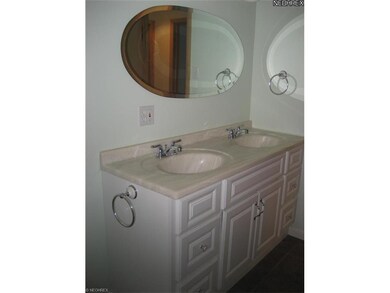 Main bathroom with double bowl sinks.
