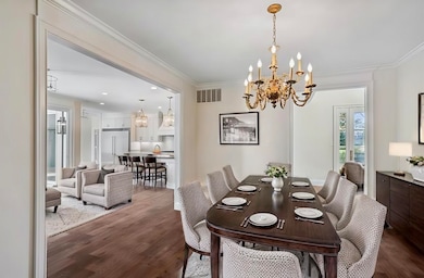 Dining area featuring ornamental molding, sink, da