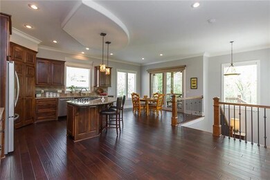 Hand scraped engineered hardwoods throughout main 