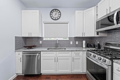 Kitchen with stainless steel appliances, light st