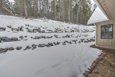 View of yard layered in snow