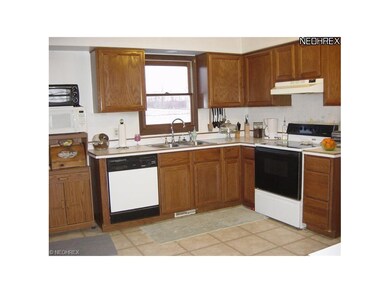 The spacious, well-appointed eat-in kitchen provid
