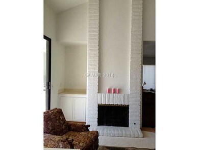 Property Photo. Fire place and bar