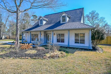 LOVELY VIEW OF THE HOME WITH MATURE TREES AND LOTS OF PRIVACY!