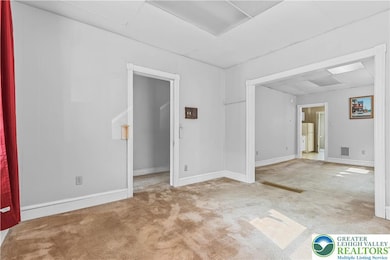 view 2 of front room off entry