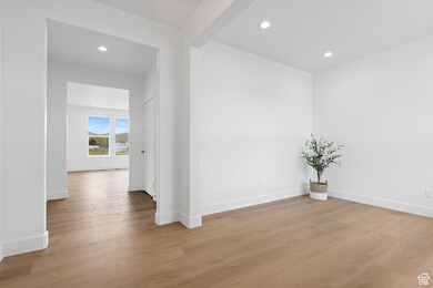 Entry with recessed lighting, baseboards, and hardwood finished floors