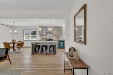 Interior space featuring hardwood floors and a kit