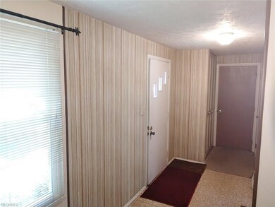 Entering into the front door, you can see the exit