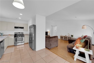 Kitchen with stainless steel appliances, under cab