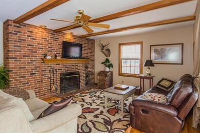 Brick fireplace in family room.