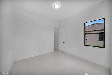 1150 Eclipse St E, Lehigh Acres, FL 33974 - photo 6