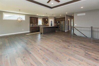 Living Room area into kitchen - nice open floor pl
