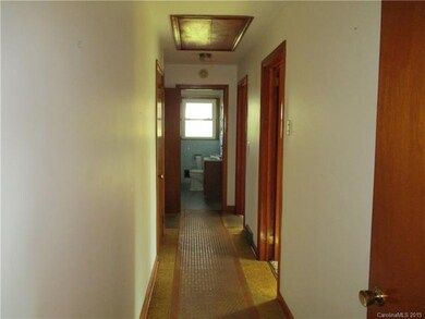 hallway to bedrooms and baths