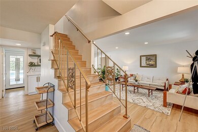 Entry with stairway to second story, original wrou
