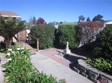 Private courtyard entry to both front and side doo