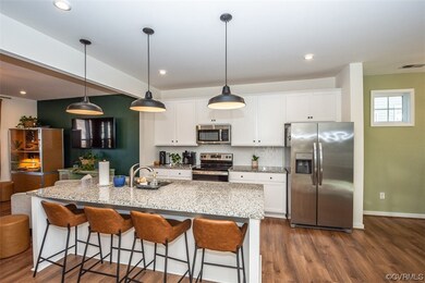 Kitchen with dark hardwood / wood-style floors, ha