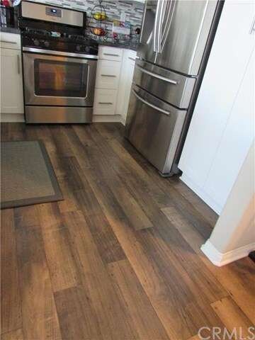 Gorgeous flooring with Stainless steel appliances