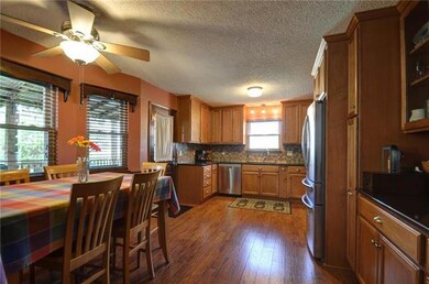 Brand new kitchen cabinets feature soft close, two