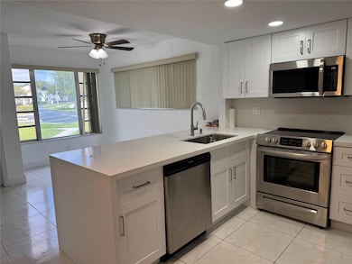 8031 Lagos de Campo Blvd unit L3, Tamarac, FL 33321 - photo 2