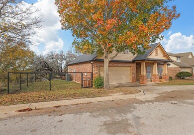 View of front of property with central AC unit and
