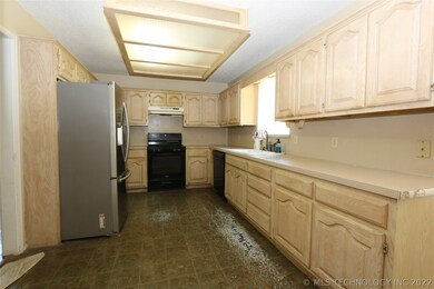 Kitchen with tons of cabinets and counter space.