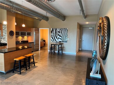 Kitchen featuring dark countertops, backsplash, a