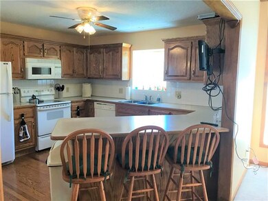 Kitchen is clean & bright.