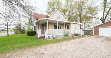 1017 N Hudson St, Lowell, MI 49331 - photo 2