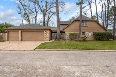 The 3 car detached garage has a wide driveway for easy access.