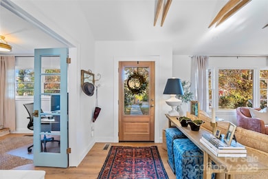 A glance back at your new front door says it all—new interior paint and wide-plank French Oak flooring await. Welcome home!