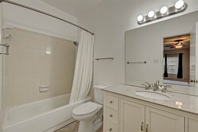 The Primary Bedroom en-suite Bath with pretty upda