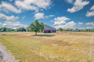 View of yard with a rural view