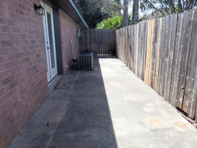 Property entrance with brick siding