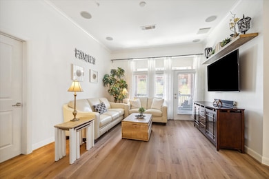 This inviting living room features a cozy seating