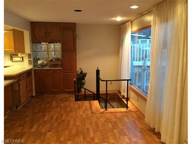 Dining area integral to kitchen, living room, and 
