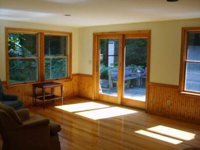 Other Family Room with hardwood floors & doors to 