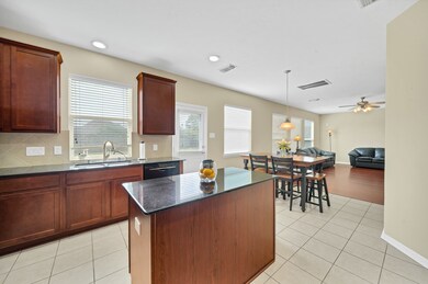 Open concept kitchen, breakfast area, and living r