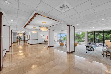 Recently upgraded lobby area leading to community room, beauty spa, mailroom and three elevator banks.