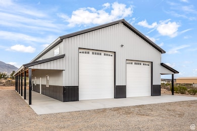 Detached garage with a mountain view