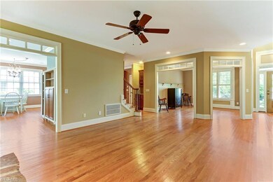Living Room looking into Breakfast Area and Dining Room