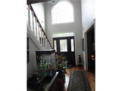 Two Story Foyer  Love the Natural Light from the C