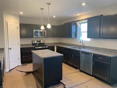 Large pantry.  GE stove, microwave and dishwasher