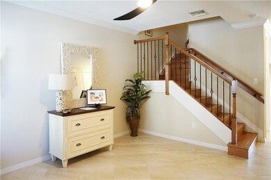 HERE ARE THE STAIRS AND THE FRONT ENTRANCE ROOM