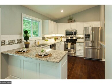 Beautifully remodeled kitchen with granite counter