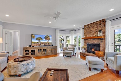 Living room with a wealth of natural light, a bric