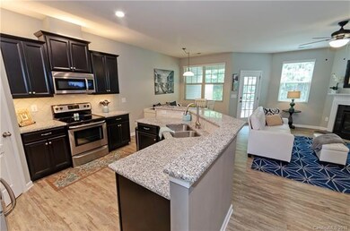 Open concept connects Kitchen, Dining Room and Liv
