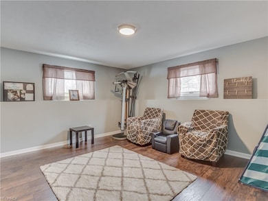 Family Room with new flooring, freshly painted.